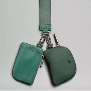 Brand new Lululemon duel wristlet Forest/Medium Green
